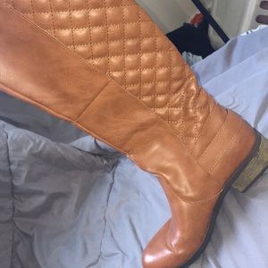 Brown high boots with a wedge